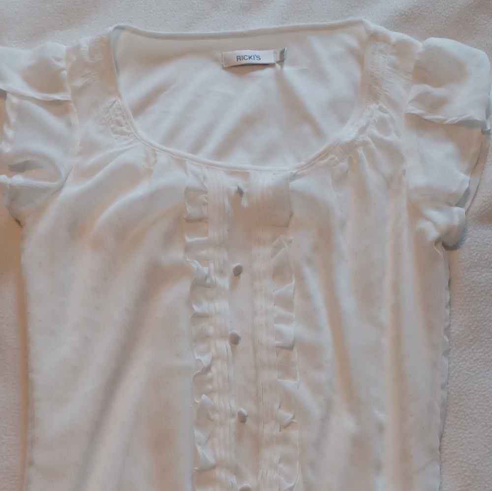 White tulip-sleeve swiss-dot lined blouse
